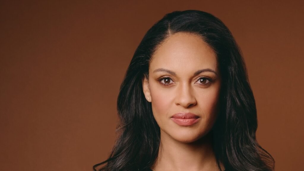 Cynthia Addai-Robinson as Treasurer Marybeth Medina