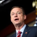 Trump extends federal hiring freeze